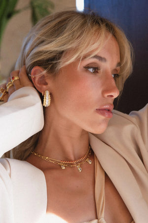 Marilyn Earrings by Porter Jewellery — gold CZ-studded earrings with polished rawa detailing, perfect for elegant and unforgettable styling.