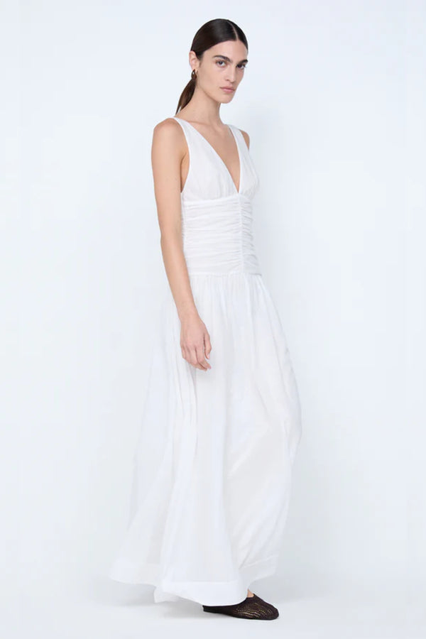 Marlowe Maxi Dress by Bec + Bridge, a white cotton voile maxi with V neckline, dropped waist, and gathered skirt—perfect for bridal or daytime elegance.