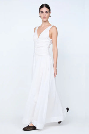Marlowe Maxi Dress by Bec + Bridge, a white cotton voile maxi with V neckline, dropped waist, and gathered skirt—perfect for bridal or daytime elegance.