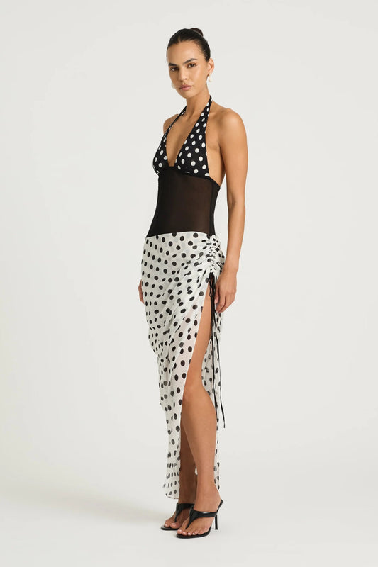 Marnie Maxi Dress by Benni, black and white polka halter maxi with deep plunge neckline, adjustable ruching and flowing skirt.