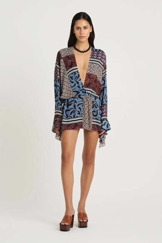 Marnie Shirt Dress by Benni, a breezy resort mini with adjustable waist and deep V neckline. Perfect for summer escapes or sunny weekends.