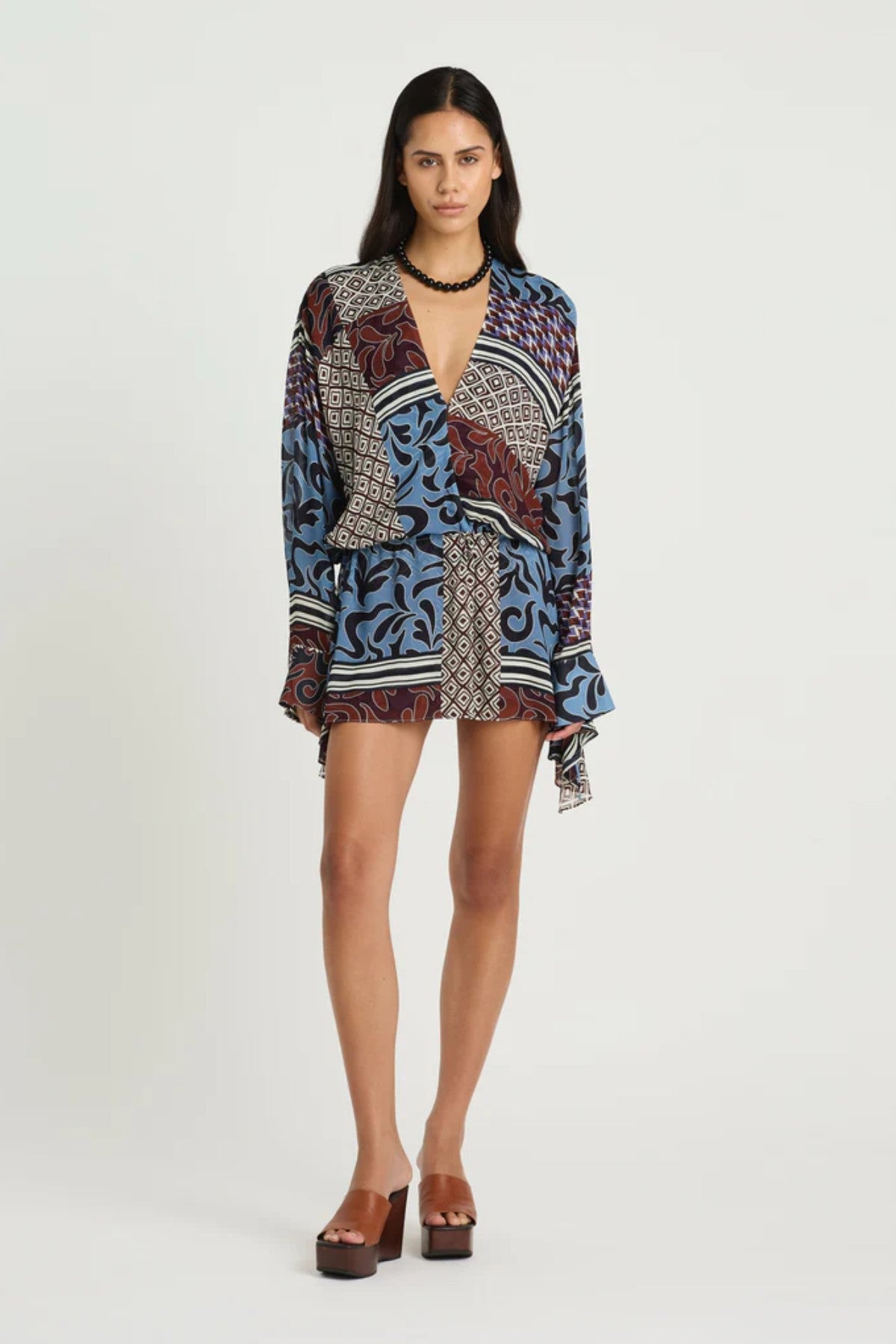 Marnie Shirt Dress by Benni, a breezy resort mini with adjustable waist and deep V neckline. Perfect for summer escapes or sunny weekends.