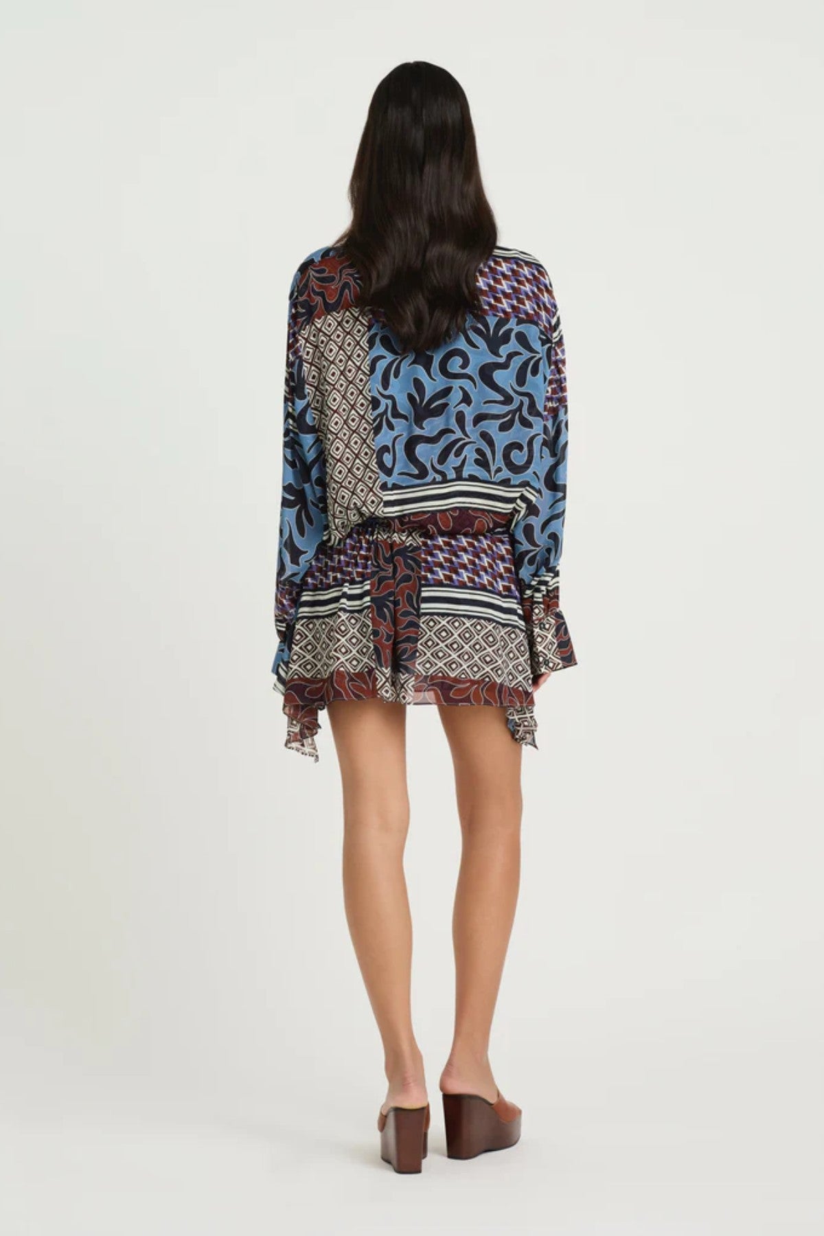 Marnie Shirt Dress by Benni, a breezy resort mini with adjustable waist and deep V neckline. Perfect for summer escapes or sunny weekends.