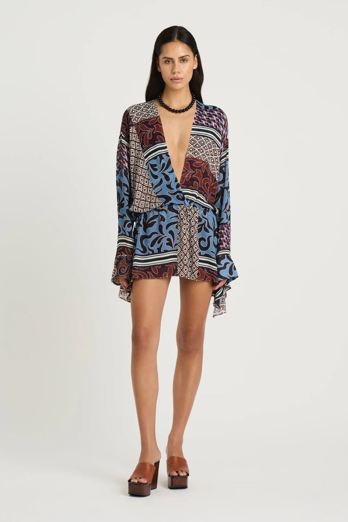 Marnie Shirt Dress by Benni, a breezy resort mini with adjustable waist and deep V neckline. Perfect for summer escapes or sunny weekends.