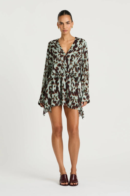 Marnie Shirt Dress in Motion Floral by Benni, a relaxed mini shirt dress with deep V neckline, adjustable waist, and long sleeves.