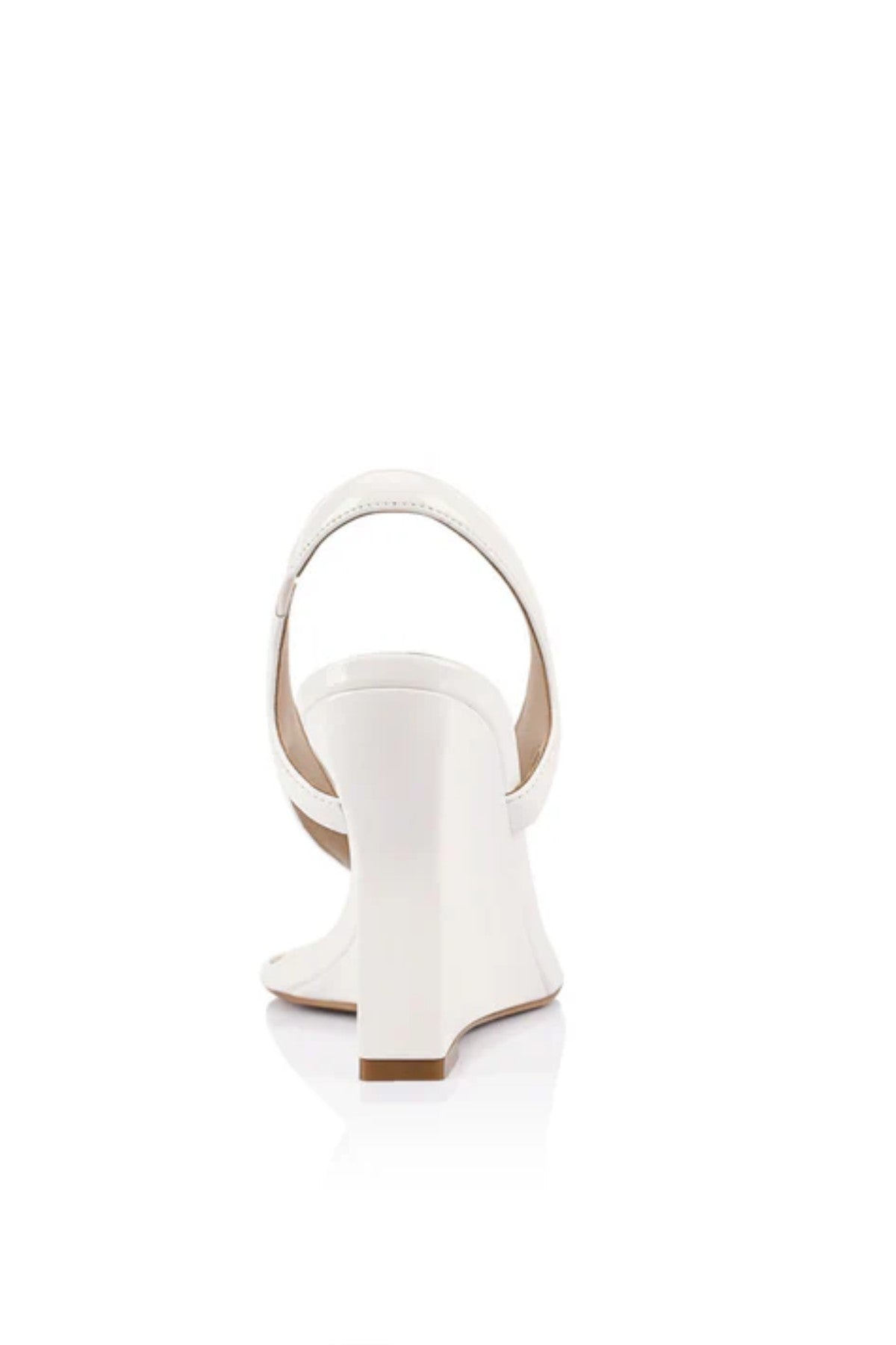 Martine Wedge by Lana Wilkinson — a white leather T-bar wedge with a sculpted 9.5cm heel, perfect for clean and elegant summer styling.