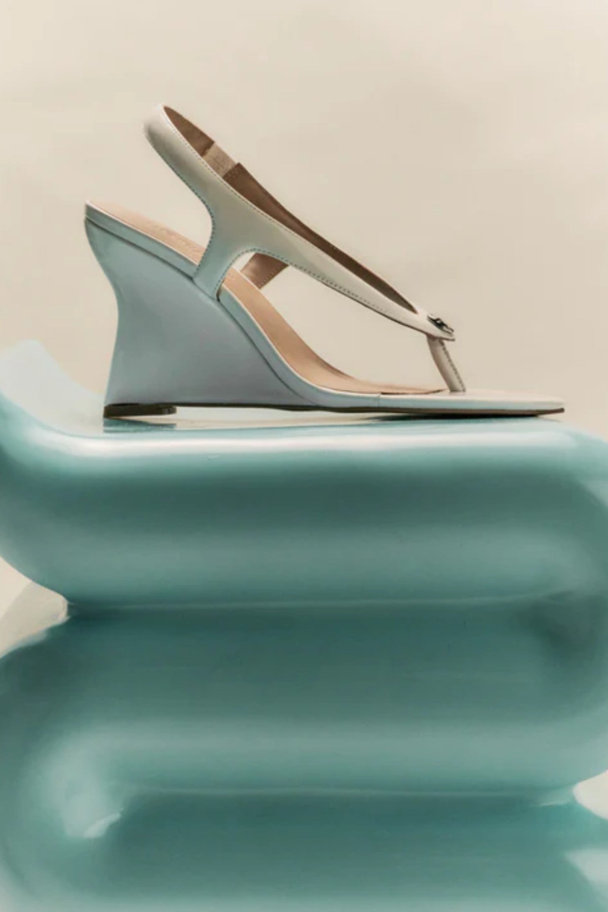 Martine Wedge by Lana Wilkinson — a white leather T-bar wedge with a sculpted 9.5cm heel, perfect for clean and elegant summer styling.