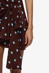 Mathilde Halter Mini Dress Polka Dot by Bec + Bridge – a halter mini with wrap detail and print. Perfect for statement styling.