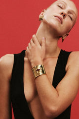 Matilde Cuff by Heaven Mayhem – a gold architectural cuff with deep burgundy enamel, perfect for bold refined styling.