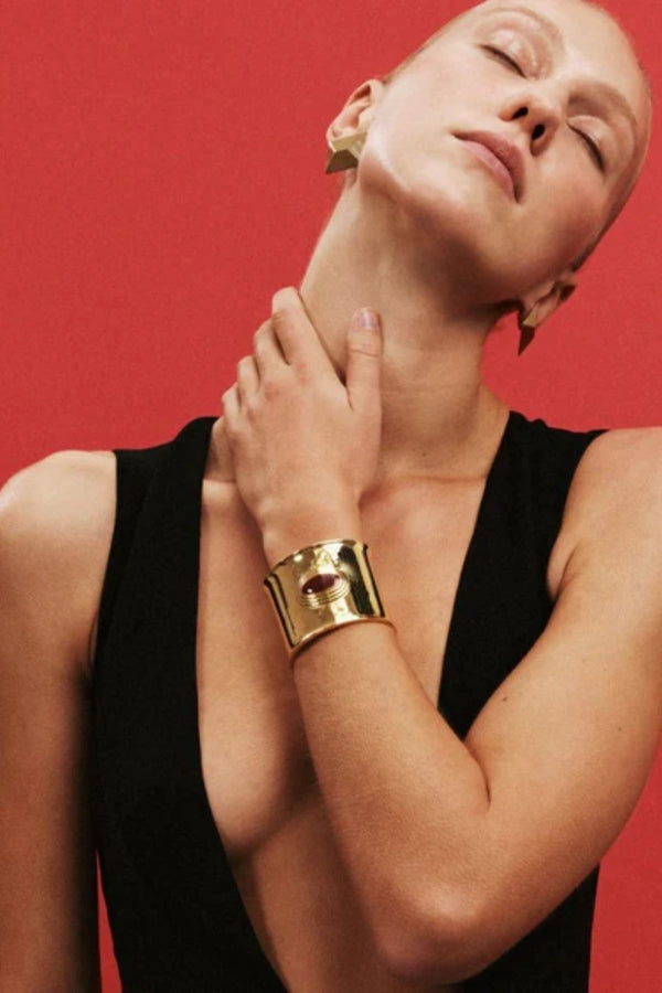 Matilde Cuff by Heaven Mayhem – a gold architectural cuff with deep burgundy enamel, perfect for bold refined styling.