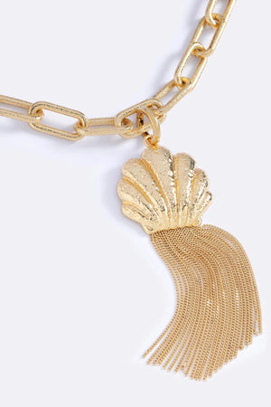 Meet Me In Ibiza Necklace Gold by Emma Pills – 14K gold plated chain necklace with detachable shell charm and fringe detail.