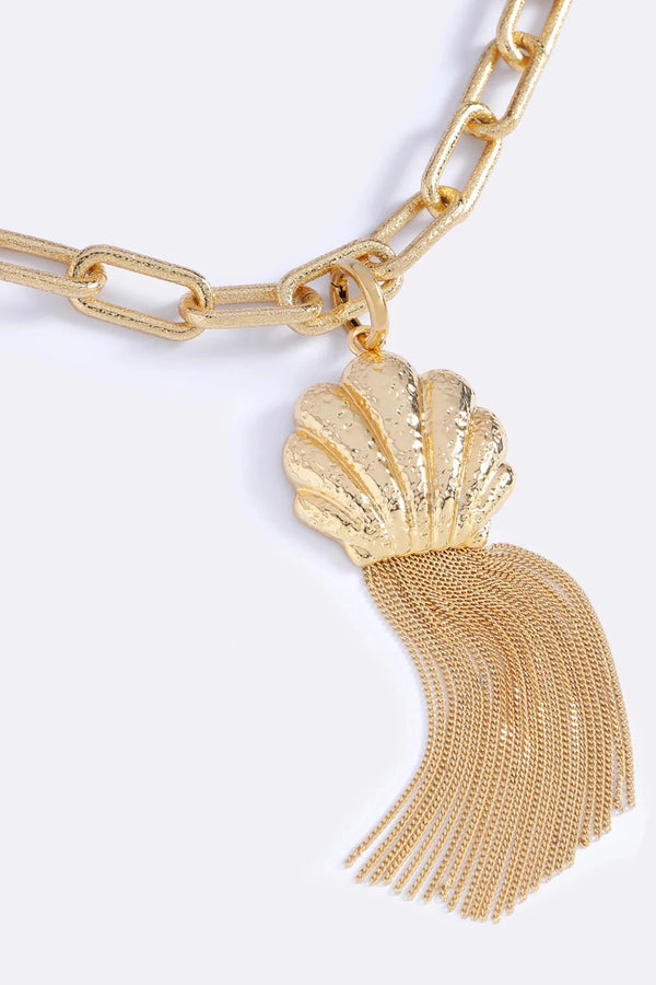 Meet Me In Ibiza Necklace Gold by Emma Pills – 14K gold plated chain necklace with detachable shell charm and fringe detail.