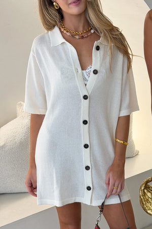 Melissa Knit Mini Dress Ivory by Sneaky Link – a collared button-down knit mini with soft drape. Perfect for easy summer styling.