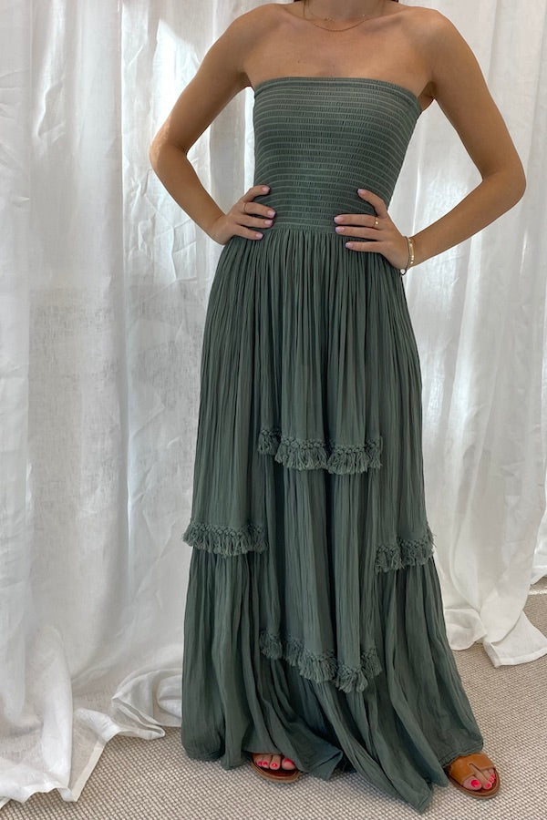Melita Dress Khaki by D' Artemide – a strapless dress with ruched bodice and tiered skirt. Perfect for beachside styling.