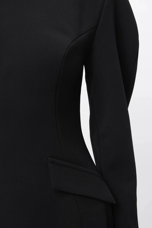 Memento Mini Dress Black by Mossman – structured stretch crepe mini dress with shoulder pads and hourglass silhouette.
