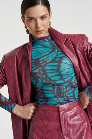 Mesh Long Sleeve Rouched Skivvy Jade Butterfly by Summi Summi – sheer ruched mesh top with signature butterfly print.