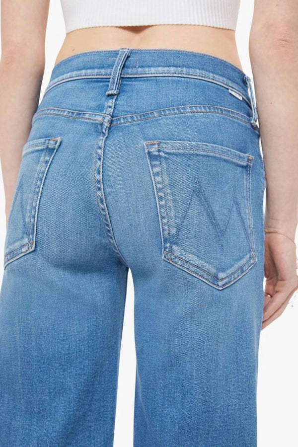Mid Rise Rambler Zip Ankle in Out Of The Blue by MOTHER, mid-rise jeans with wide straight leg, ankle-length fit, and soft faded blue wash.
