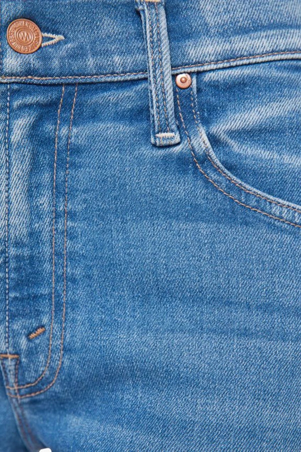 Mid Rise Rambler Zip Ankle in Out Of The Blue by MOTHER, mid-rise jeans with wide straight leg, ankle-length fit, and soft faded blue wash.