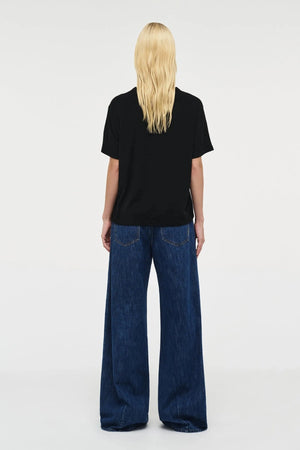 Milla Wide Indie by Neuw Denim, mid-rise wide-leg jean in lightweight rigid denim with ultra-long inseam, a trendy relaxed piece perfect for modern effortless style.