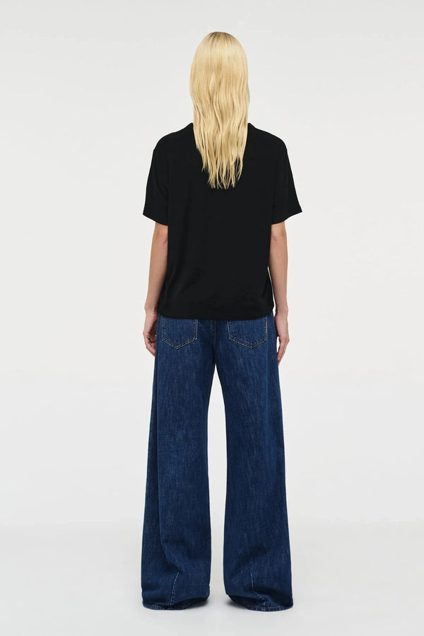 Milla Wide Indie by Neuw Denim, mid-rise wide-leg jean in lightweight rigid denim with ultra-long inseam, a trendy relaxed piece perfect for modern effortless style.