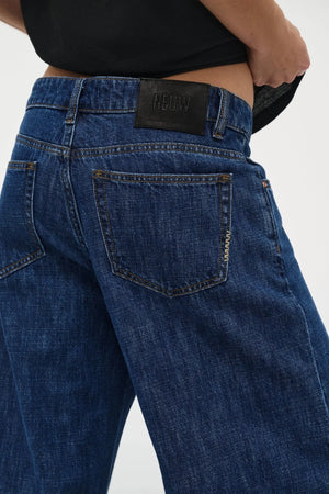 Milla Wide Indie by Neuw Denim, mid-rise wide-leg jean in lightweight rigid denim with ultra-long inseam, a trendy relaxed piece perfect for modern effortless style.