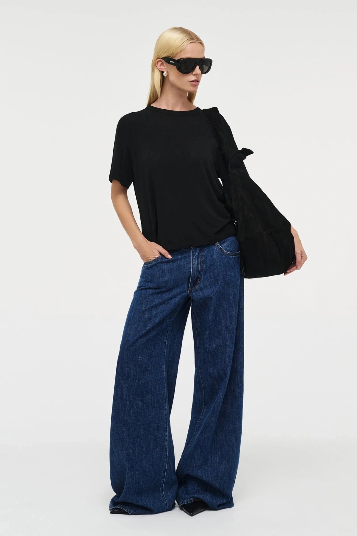 Milla Wide Indie by Neuw Denim, mid-rise wide-leg jean in lightweight rigid denim with ultra-long inseam, a trendy relaxed piece perfect for modern effortless style.