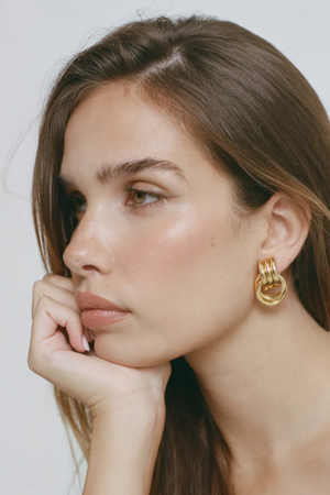Mini Knot Earrings Gold by Heaven Mayhem – gold knot earrings with sleek design. Perfect for everyday styling.