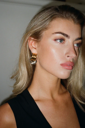 Mini Knot Earrings Mixed Metals by Heaven Mayhem – gold and silver knot earrings. Perfect for everyday styling.