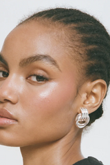 Mini Knot Earrings Silver by Heaven Mayhem – silver knot earrings with sleek design. Perfect for everyday styling.