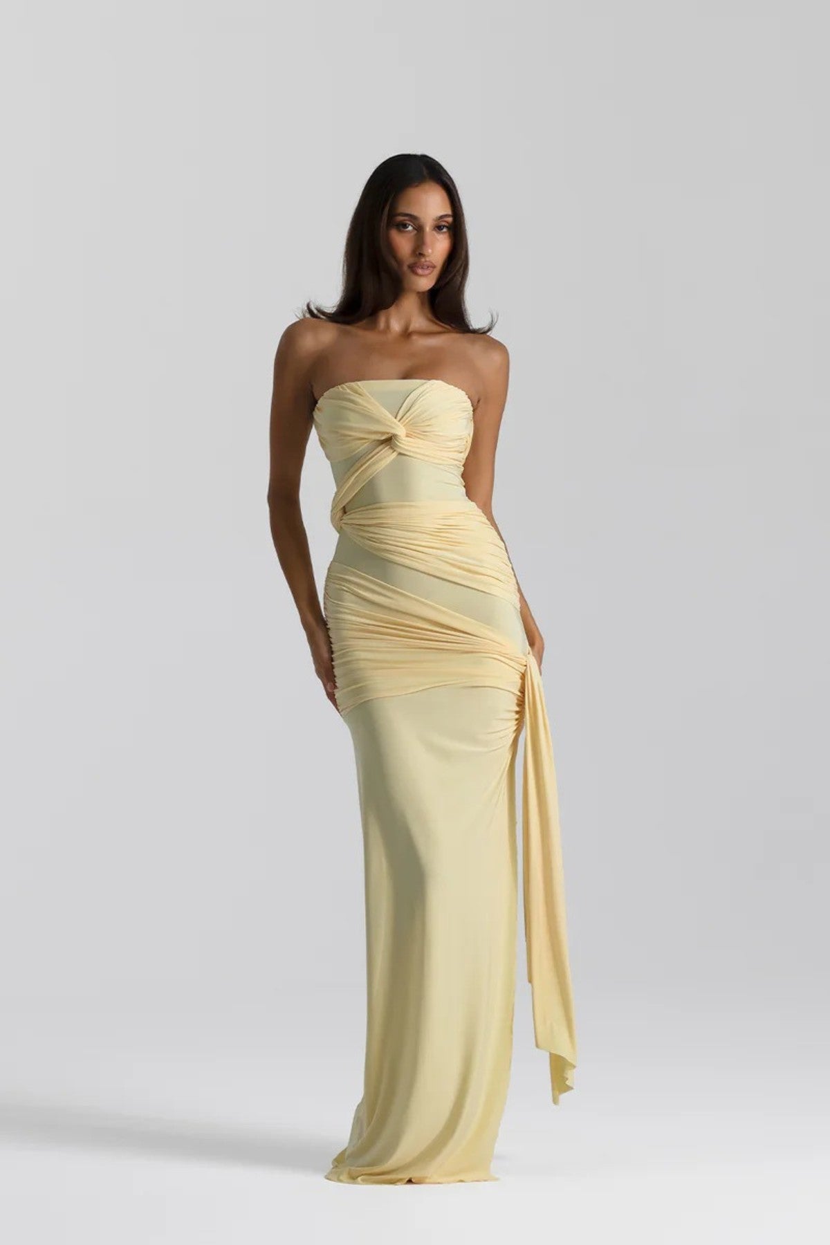 Miranda Gown by Natalie Rolt, strapless stretch Cavalli gown with knot bust detail, side tie, and elegant split for a sculpted feminine fit.