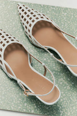 Miranda Pump White Leather by Lana Wilkinson – a mid heel pump with cage detail and buckle strap. Perfect for day-to-night wear.