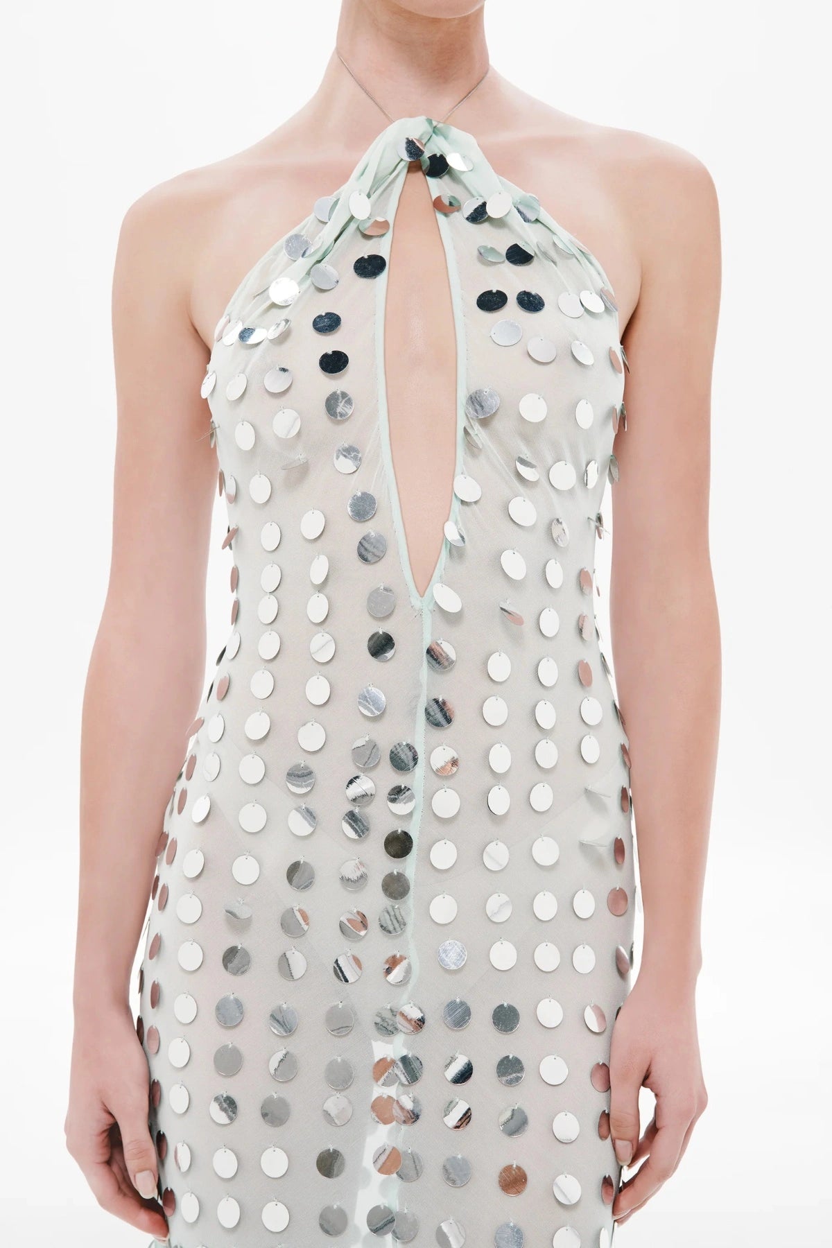 Mirror Bead Dress by MISHA — a sheer georgette maxi with reflective disc sequins and a chain neck clasp, perfect for luminous evening events.