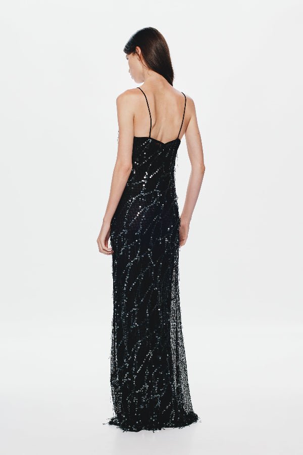Onyx Sequin Dress by Misha, a sheer black gown with sequins, plunging neckline, and open back. Perfect for glamorous evenings.