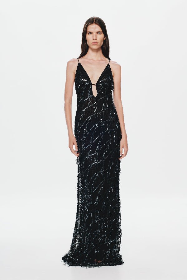 Onyx Sequin Dress by Misha, a sheer black gown with sequins, plunging neckline, and open back. Perfect for glamorous evenings.