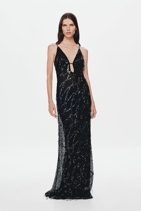 Onyx Sequin Dress by Misha, a sheer black gown with sequins, plunging neckline, and open back. Perfect for glamorous evenings.
