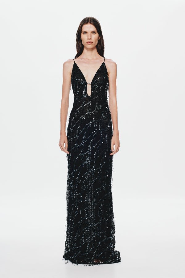 Onyx Sequin Dress by Misha, a sheer black gown with sequins, plunging neckline, and open back. Perfect for glamorous evenings.