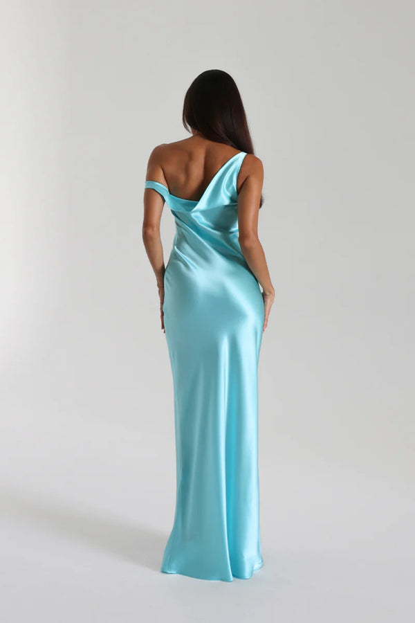 Monika Gown Turquoise by Natalie Rolt, a bias-cut silk gown with asymmetrical drape and refined fit for elegant occasions.
