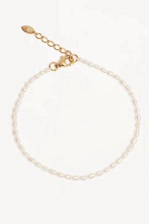 Moonlight Bracelet by By Charlotte, an 18k gold vermeil piece with freshwater pearls. Perfect for meaningful everyday layering.