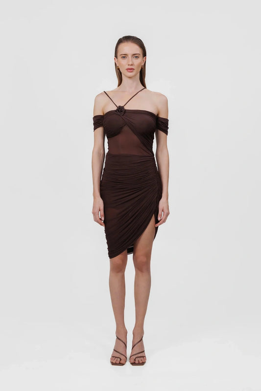 Moreno Dress in Wood by Maygel Coronel, a ruched off-shoulder mini with sheer panelling and floral detail. Perfect for summer events.

