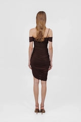 Moreno Dress in Wood by Maygel Coronel, a ruched off-shoulder mini with sheer panelling and floral detail. Perfect for summer events.
