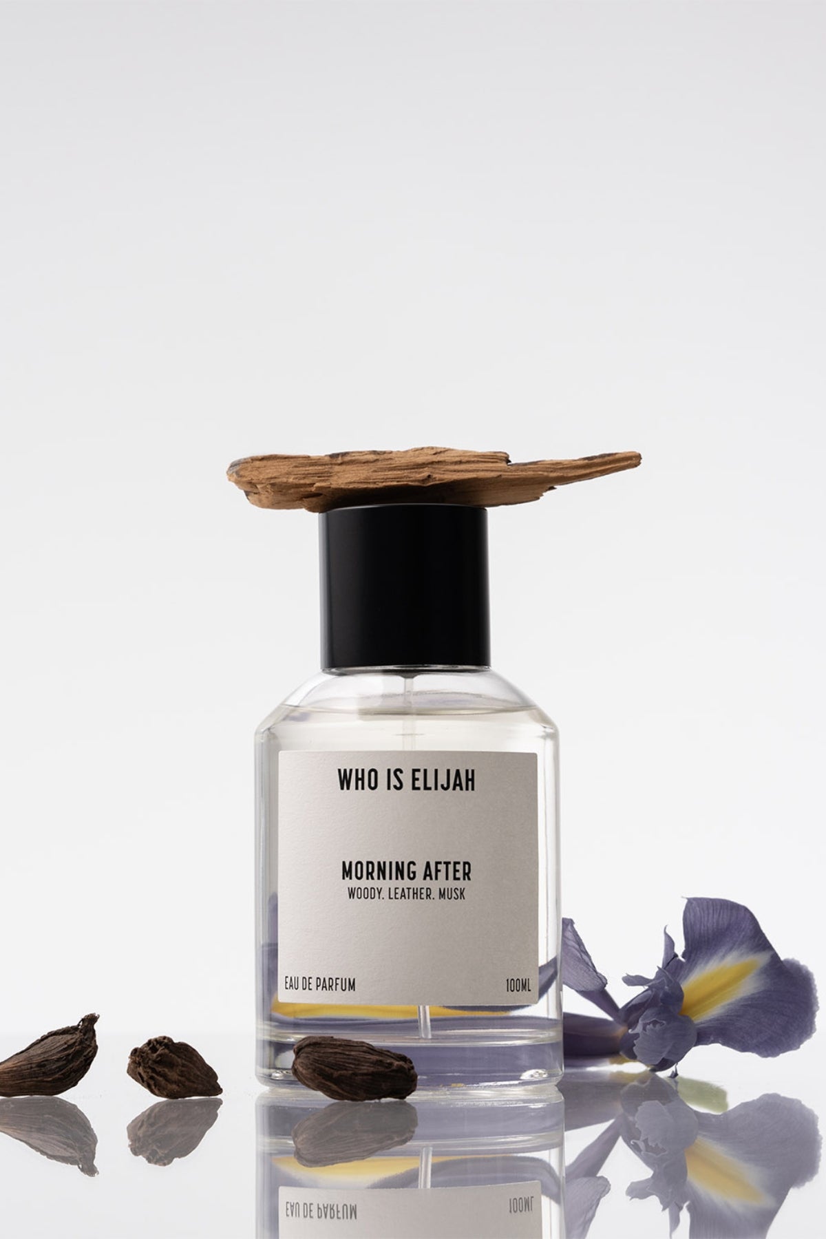 Morning After by Who Is Elijah, a unisex scent with violet and cardamom top notes, iris and papyrus heart, and a musk, leather, and amber base.
