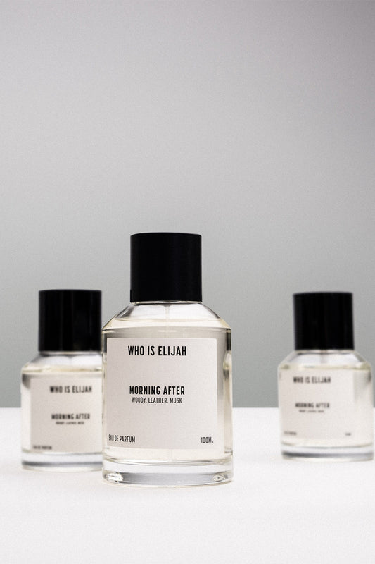 Morning After by Who Is Elijah, a unisex scent with violet and cardamom top notes, iris and papyrus heart, and a musk, leather, and amber base.