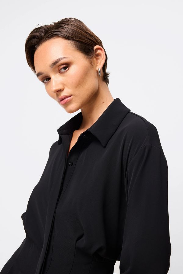 Mossman Good Intentions Mini Dress in Black, a chic blouson mini with classic shirt collar, gathered waist, and buttoned cuffs for versatile day-to-night styling.