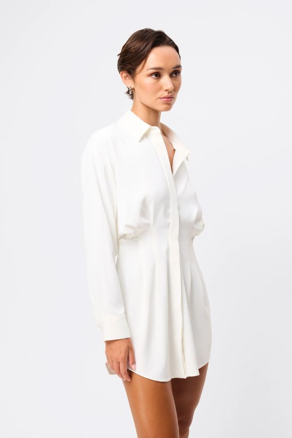 Mossman Good Intentions Mini Dress in White, a chic blouson mini with classic shirt collar, gathered waist, and buttoned cuffs for effortless elegance.