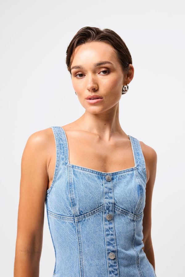 Mossman In A Daze Midi Dress in Vintage Blue, a denim-inspired button-through midi with square neckline, contrast stitching, and chic fit-and-flare silhouette.