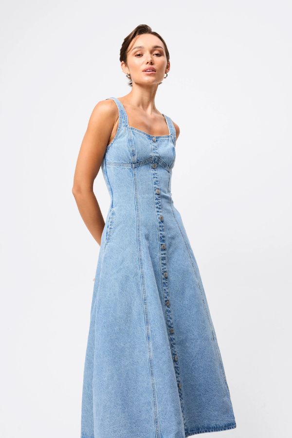 Mossman In A Daze Midi Dress in Vintage Blue, a denim-inspired button-through midi with square neckline, contrast stitching, and chic fit-and-flare silhouette.