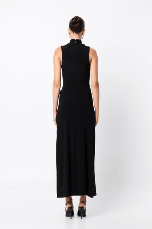 Rebellion Maxi Dress by Mossman, a black stretch jersey gown with high neckline, buckle wrap detail, and front split. Perfect for nights out.