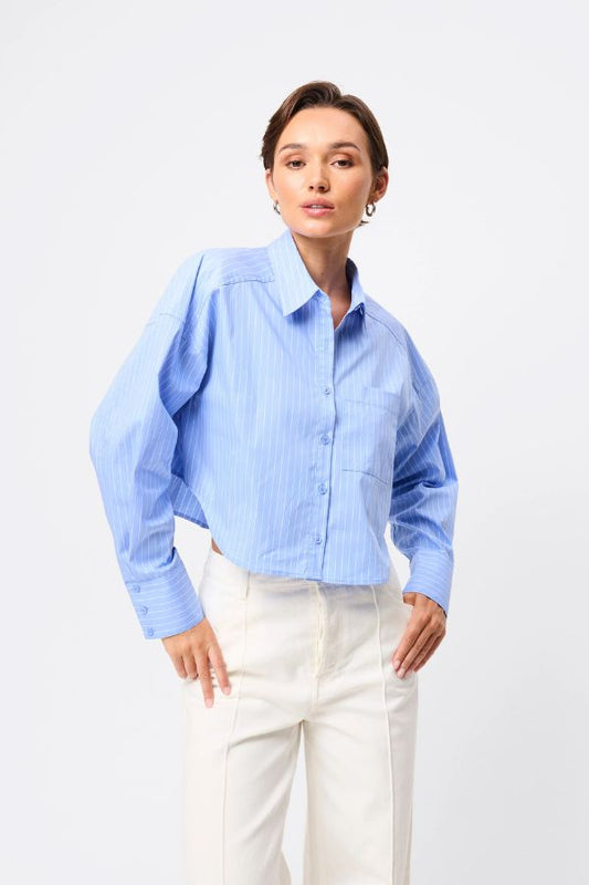 Mossman Repeat After Me Cropped Shirt in Blue Stripe, a chic cropped button-up with crisp white stripes, patch pockets, and extended cuffs for elevated everyday style.