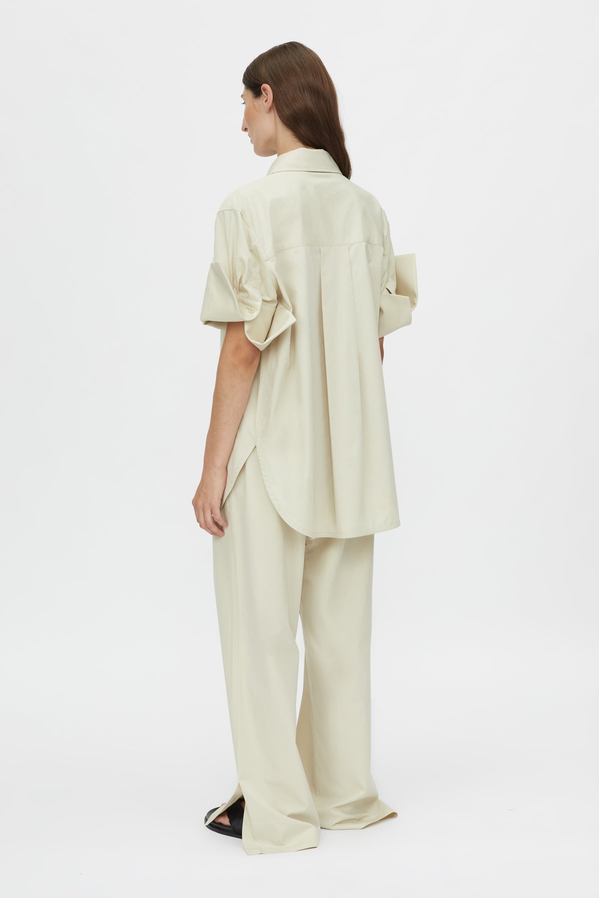 Camilla and Marc Winslow Pant Stone, a relaxed cotton-tencel pant with drawcord waist and side splits, perfect for effortless everyday sophistication.
