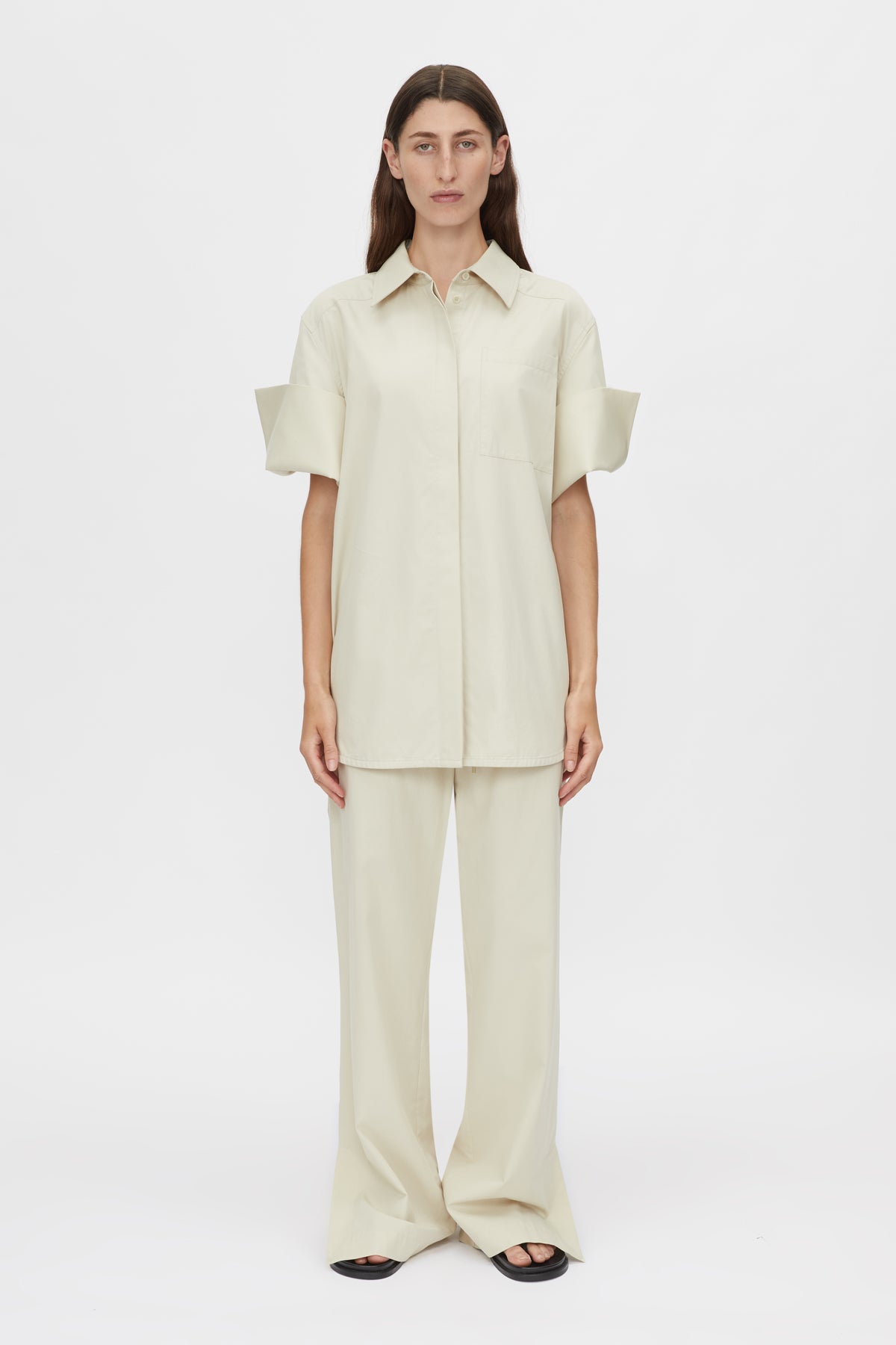 Camilla and Marc Winslow Pant Stone, a relaxed cotton-tencel pant with drawcord waist and side splits, perfect for effortless everyday sophistication.